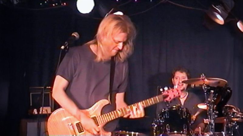 Ed Erenberg playing guitar live